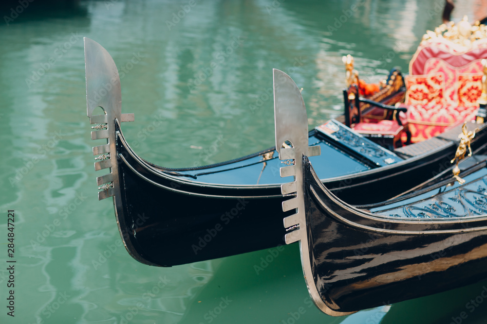 Venetian gondola and canal in Venice, Italy