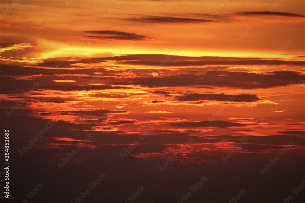Sunset and sunrise with beautiful red clouds