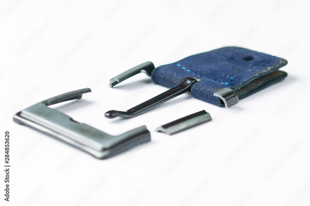 Broken blue pants belt isolated on white background.Copy space Broken blue pants belt isolated on white background.Copy space
