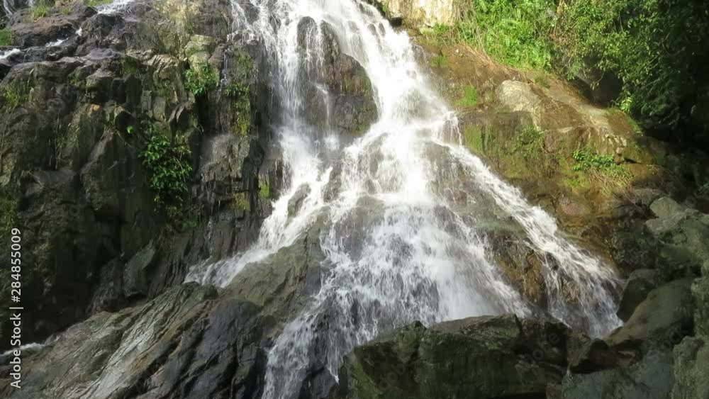 Beautiful jungle waterfall on Samui Island, Thailand. Close up Beautiful jungle waterfall on Samui Island, Thailand. Close up