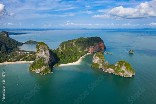 Aerial view of tropical island  turquoise lagoon and islands on horizon  Krabi  Railay  Thailand.Travelling and holiday concept.