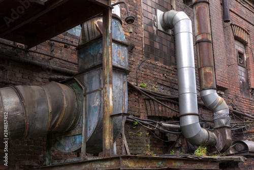 Old air duct for industrial air conditioning in the factory building.