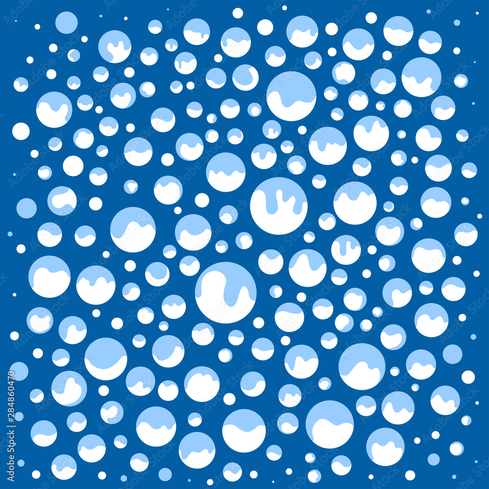 Various Round Falling Snow Balls in the blue Sky