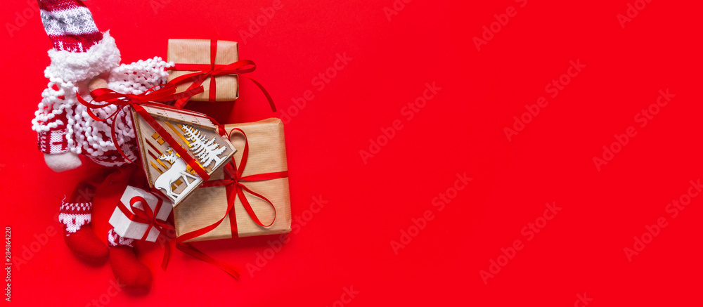 Christmas background with decorations and gift boxes on red background.. Christmas background with decorations and gift boxes on red background..