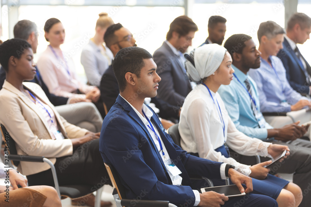 Fototapeta premium business people attending a business seminar