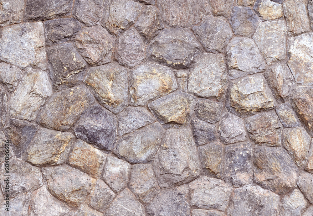 Stone wall as a background or texture. Stone wall as a background or texture.
