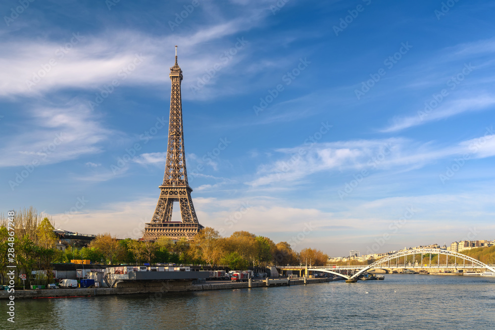 Paris France city skyline at Eiffel Tower and Seine River