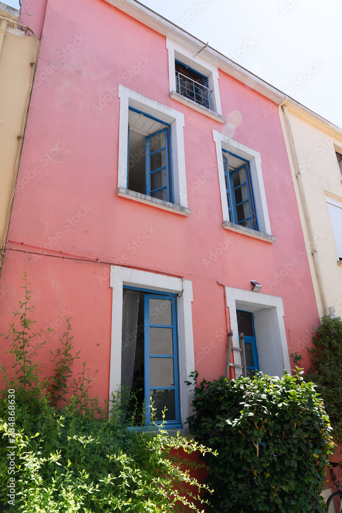 Trentemoult village in France colorful houses pink salmon and yellow