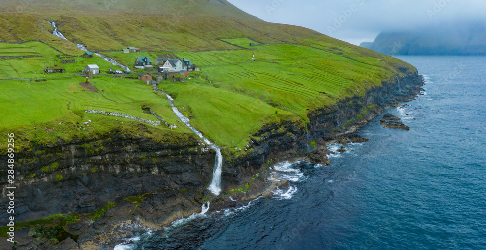 Atlantic ocean sea waves in Bordoy cliffs, Faroe Islands