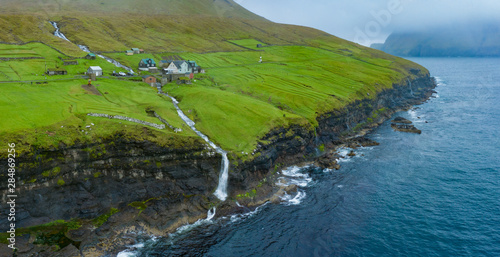 Atlantic ocean sea waves in Bordoy cliffs, Faroe Islands