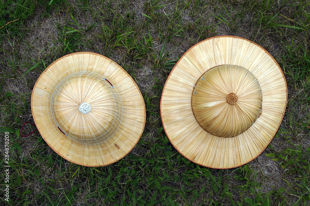 Two handmade straw hats Two handmade straw hats