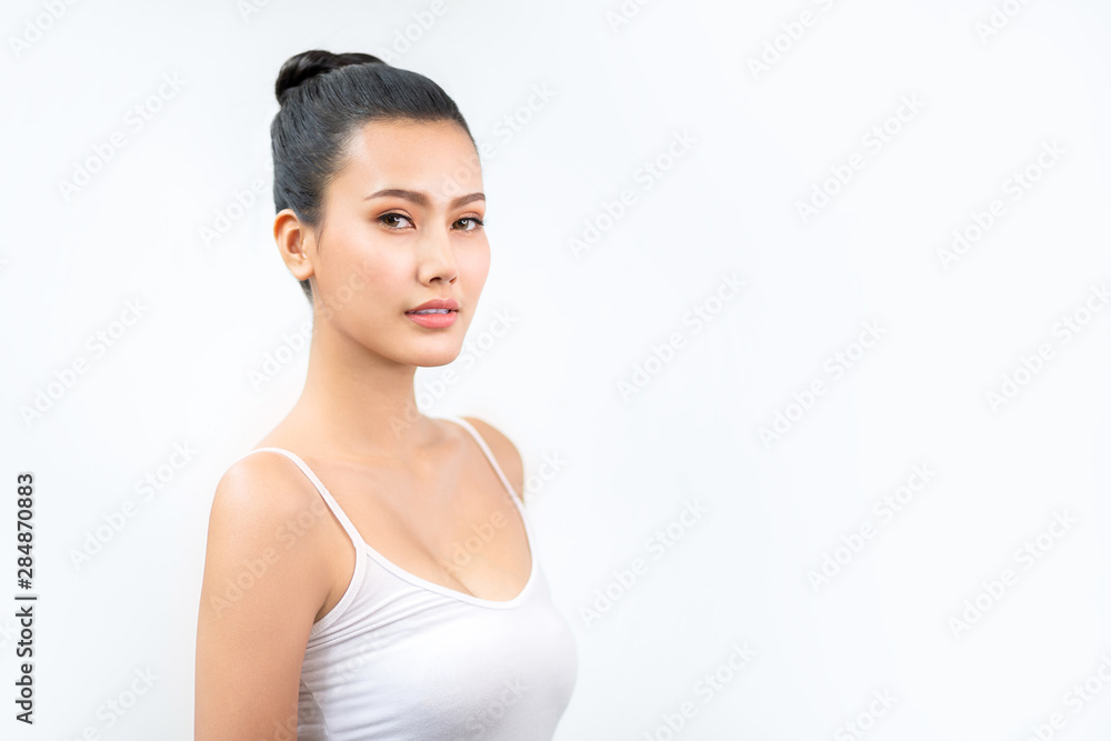 Beauty asian Woman face and Clean skin . close up beautiful girl smiling with makeup , cosmetic . portrait female isolated on white background . looking at camera Beauty asian Woman face and Clean skin . close up beautiful girl smiling with makeup , cosmetic . portrait female isolated on white background . looking at camera