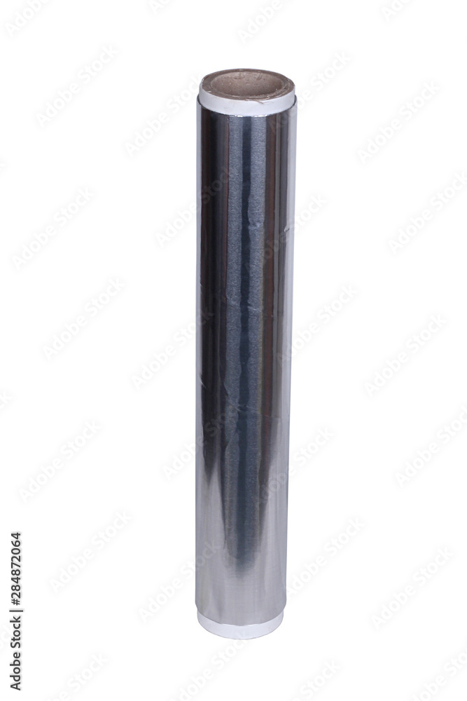 Photo of silver aluminum foil roll on white background Photo of silver aluminum foil roll on white background