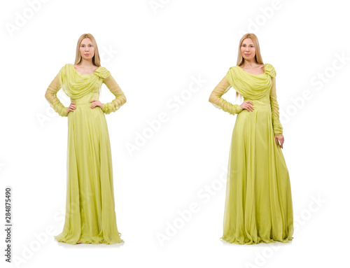 Young woman in elegant long green dress isolated on white