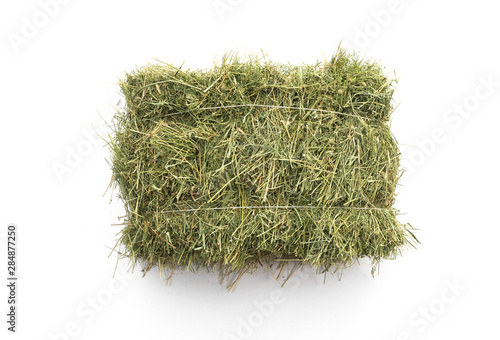 Valokuvatapetti Studio shot of straw hay on a white background.