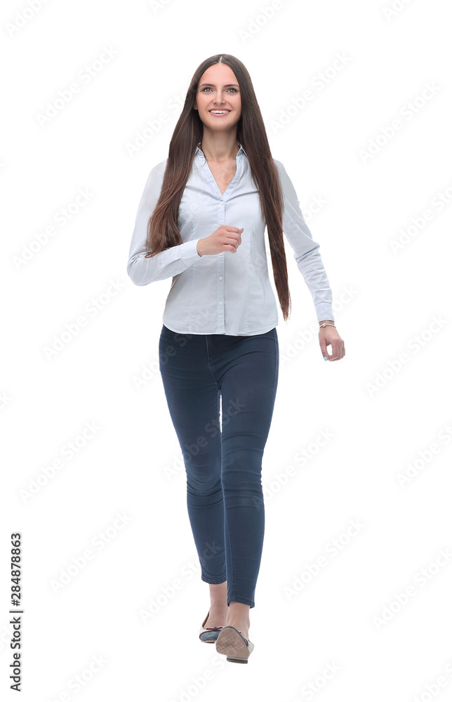 smiling young woman stepping forward. isolated on white smiling young woman stepping forward. isolated on white