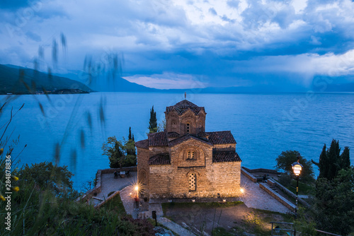 picturesquely located on a cliff above Lake Ohrid, monastery of Saint John of Kaneo in Ohrid in Northern Macedonia in the evening