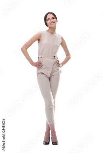 modern young woman in a pantsuit. isolated on white