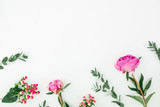 Floral composition with pink flowers and eucalyptus on white background. Flat lay, top view