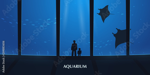 Big Aquarium, Oceanarium or Dolphinarium. People watching the underwater world.