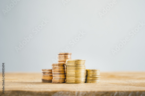 Gold coin Stack On the table save money Taking care of money