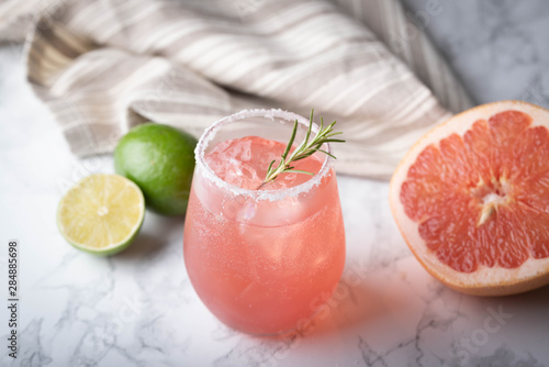 paloma cocktail with grapefruite on marble background photo
