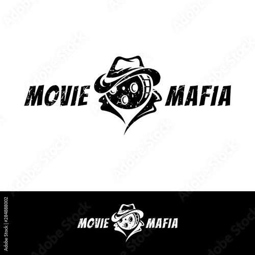 Film Reel with Man/Mafia Head Style Logo for  Movies and Cinema Production.Grunge/Rustic Flat Style