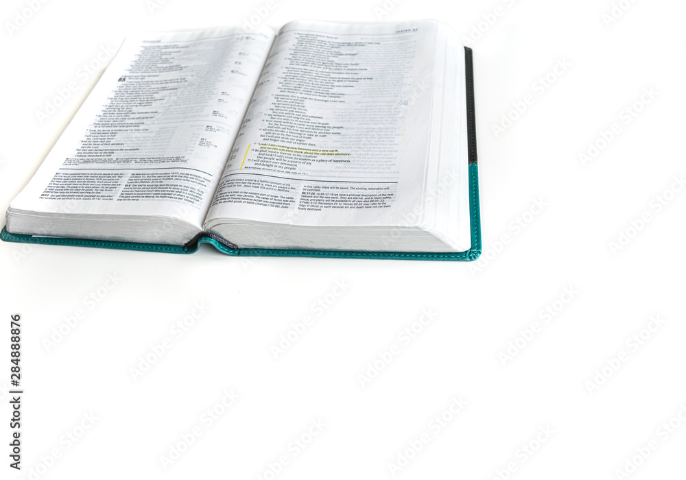 Open Bible isolated on white background. Space for text. - Baselland, Switzerland 19.08.2019 Open Bible isolated on white background. Space for text. - Baselland, Switzerland 19.08.2019
