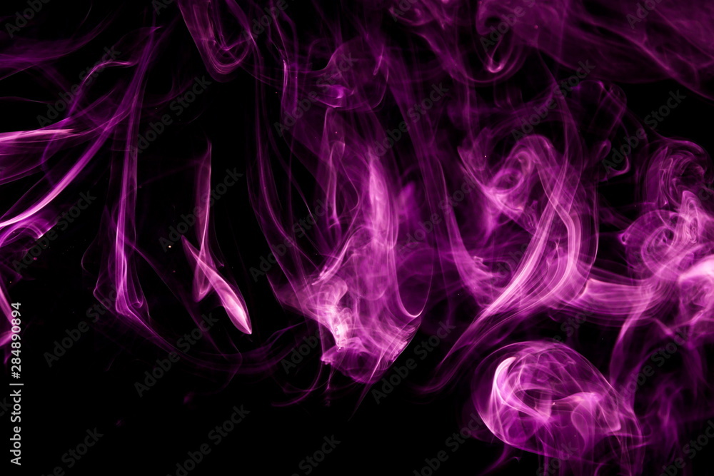 Purple smoke on black background