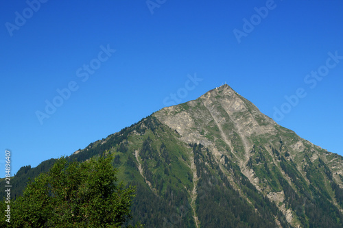 Mountain Niesen in Bernese Oberland in the morning with a clear blue sky. Summer 2019.