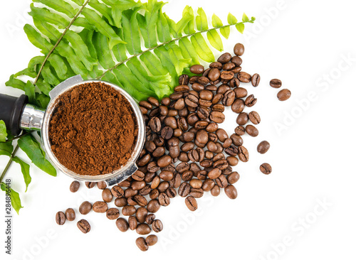 Top view ground coffee on  filled with coffee bean on white background