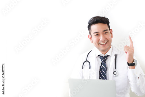 portait of Asian doctor in hospital white background