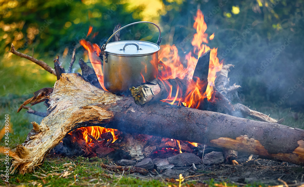 Campfire Tea Steel Kettle On The Heat Of Campfire Making Morning Coffee At  The Campsite Leisure In The Forest Active Lifestyle Concept Stock Photo -  Download Image Now - iStock