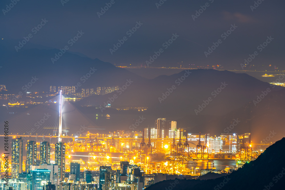 Hong Kong, China - August, 2019 :  Hong Kong cityscape at night, sky scraper building