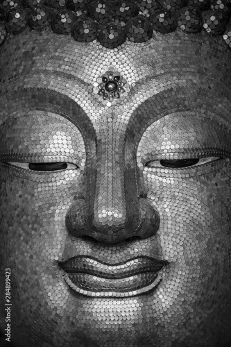 Golden Buddha image face style , hilight and shadow of buddha golden face