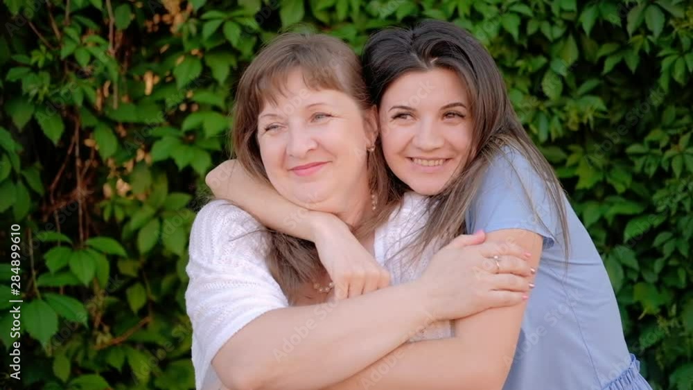 Family fun. Joy bonding entertainment. Cheerful daughter surprising mom covering eyes. Family fun. Joy bonding entertainment. Cheerful daughter surprising mom covering eyes.