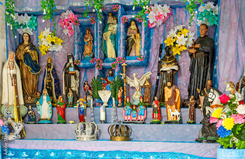 Brazilian religious altar mixing elements of umbanda, candomblé and catholicism in the syncretism present in the local culture and religion