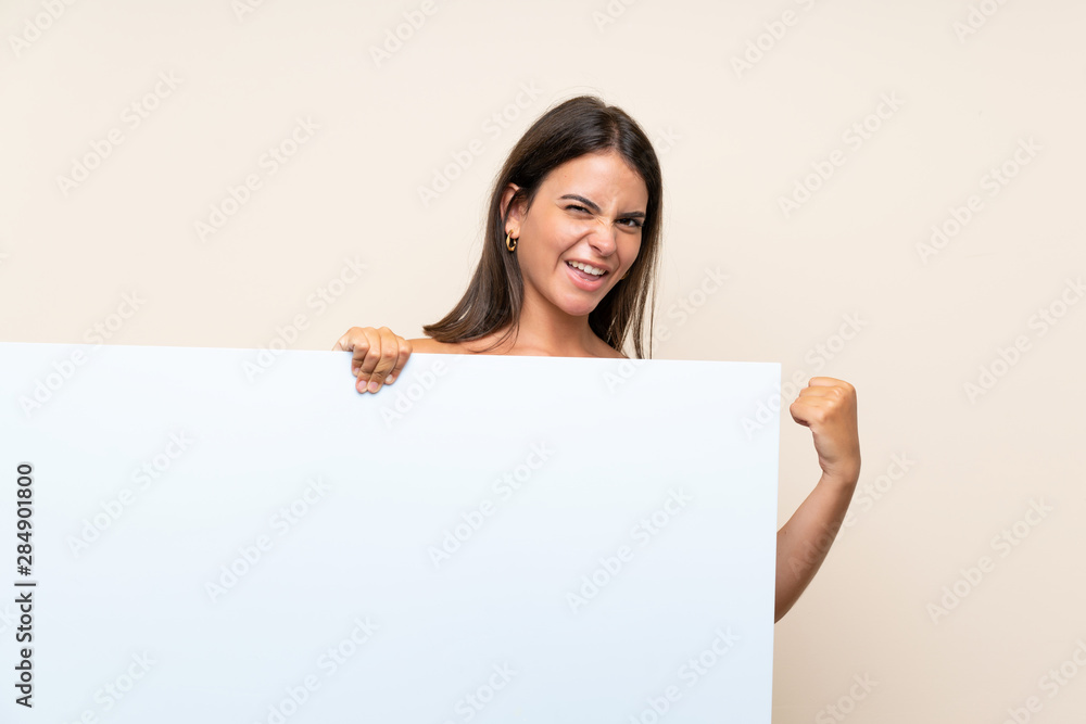 Young girl over isolated background holding an empty white placard for insert a concept Young girl over isolated background holding an empty white placard for insert a concept