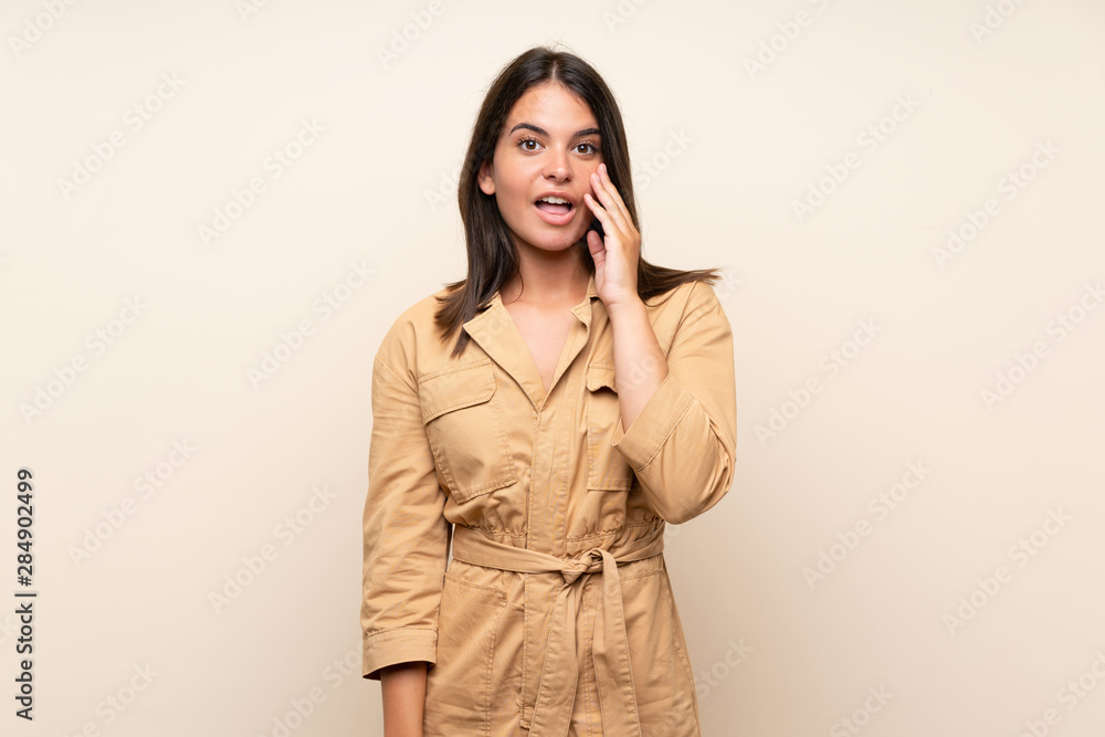 Young girl over isolated background with surprise and shocked facial expression Young girl over isolated background with surprise and shocked facial expression