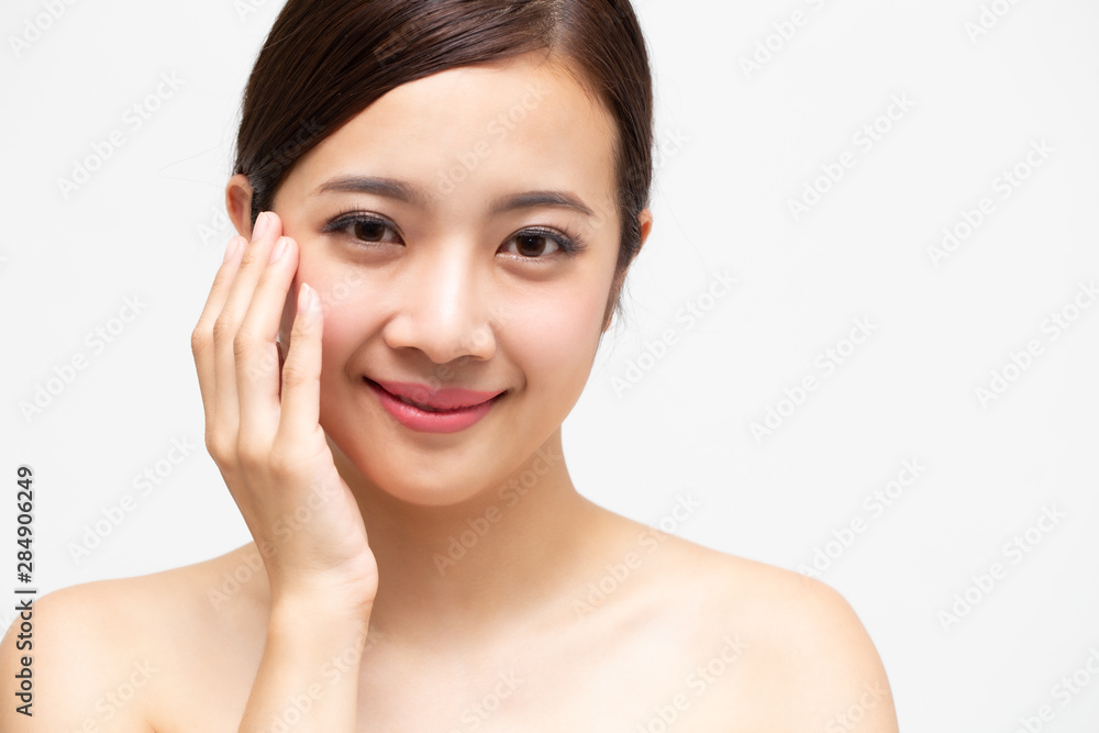 Beautiful Young Asian woman with clean fresh skin, Facial treatment and cosmetology beauty and spa concept