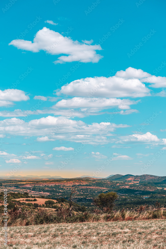 Valley view with blue sky and clouds in the evening