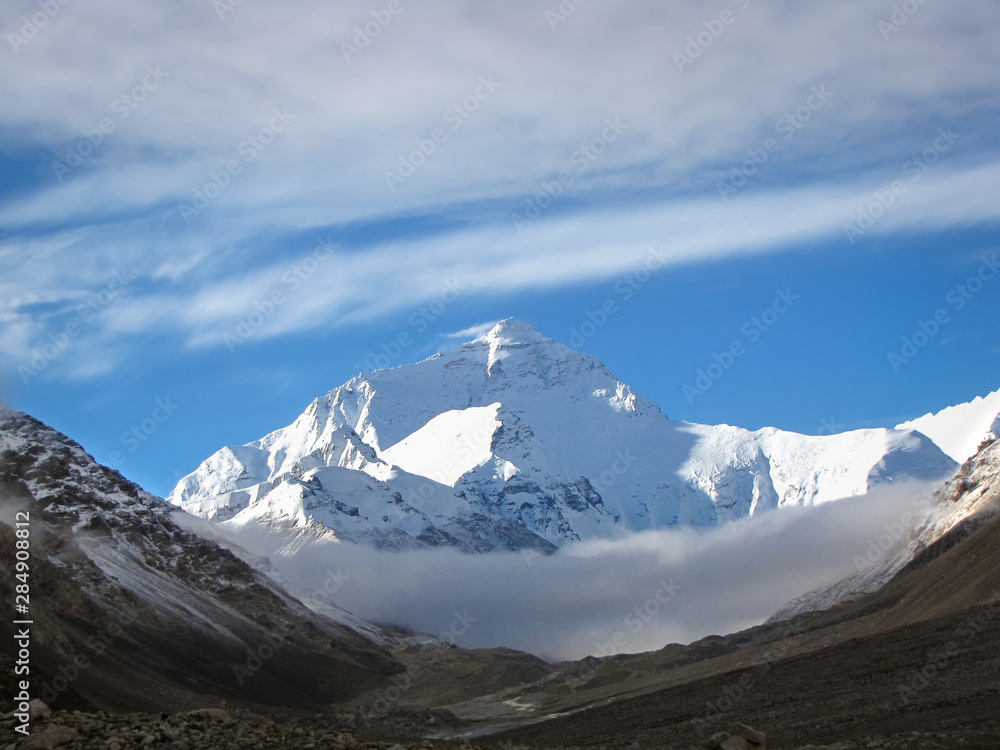 Mount Everest towering above misty clouds  seen from Tibet basecamp, China, Asia