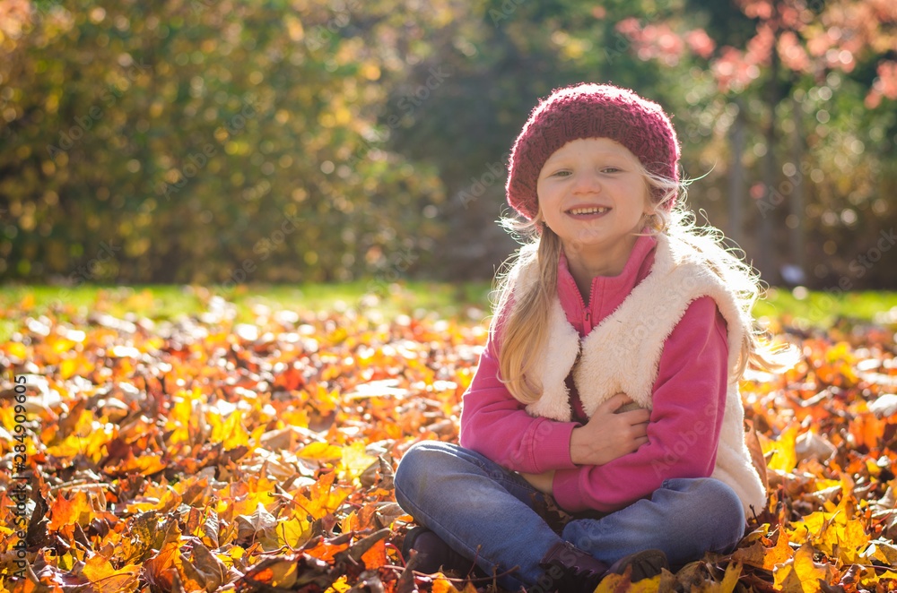 adorable child in red cap in magic sunny afternoon adorable child in red cap in magic sunny afternoon