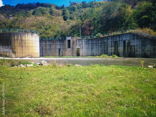 Wallpaper Mural River Water Flow And Boundary Wall Of Titab Ularan Dam Water Output Line In The Dry Season, North Bali, Indonesia Torontodigital.ca