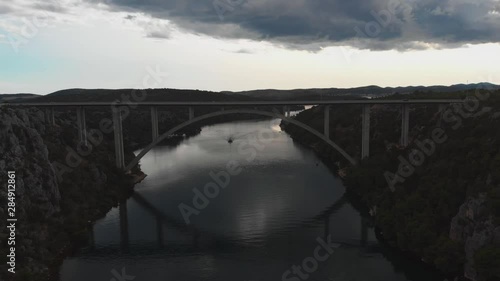 Wallpaper Mural boat on the river and passing a bridge Torontodigital.ca