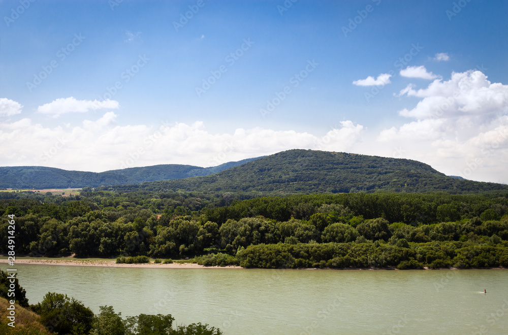Mountain surrounded by Danube river, near Devín castle and Bratislava, Slovakia, Europe. July 14, summer 2019