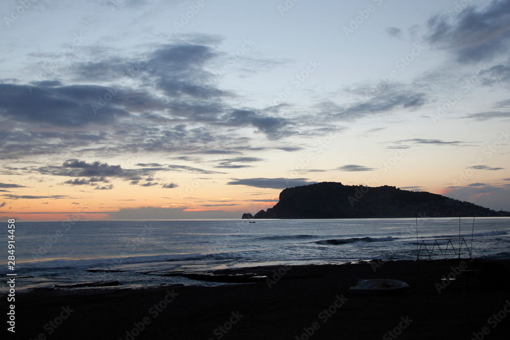 silhouette of alanya city at sunset silhouette of alanya city at sunset