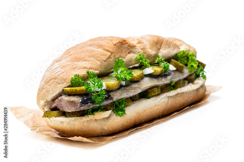 Traditional Dutch sandwich with herring and pickles isolated on white © lena_zajchikova
