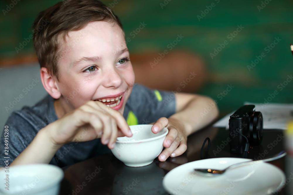 Happy child drinking tea Happy child drinking tea
