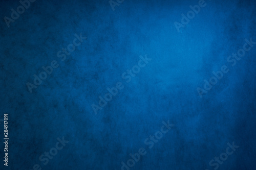 blue grey abstract background, the Studio wall is illuminated by constant light